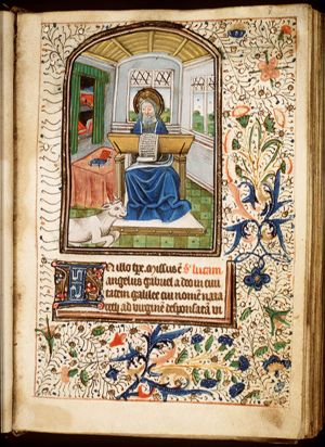The Evangelist St. Luke writing, with his symbol the ox
