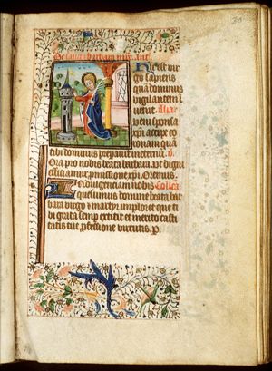 St. Barbara holding a palm, before the tower