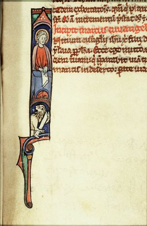 The Evangelist St. Mark writing, with his symbol the lion