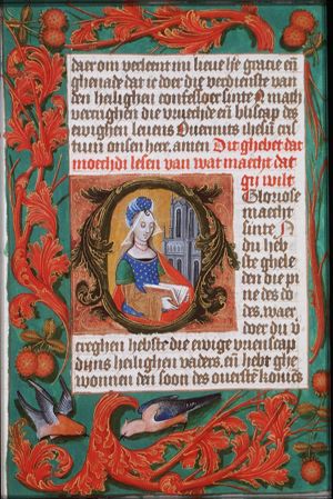 St. Barbara holding a book, before the tower