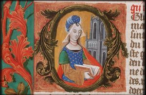 St. Barbara holding a book, before the tower