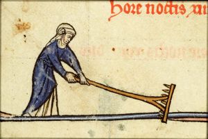 February: a woman raking