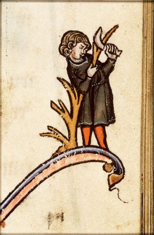 March: a man pruning a tree