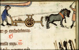 September: men ploughing