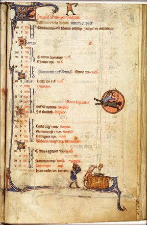 November: a man slaughtering a pig