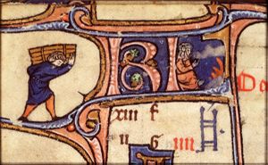 December: a woman warming herself at a fire