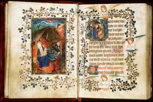 The Nativity: Mary seated, holding the Christ-child; St. Joseph; annunciation of Christ's birth to the shepherds (background)