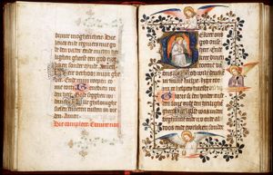 An angel holding an instrument of the Passion: sudarium <or shroud?>