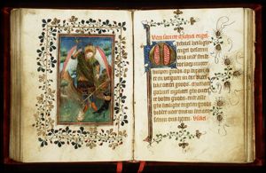 St. Michael weighing souls in the scales and stabbing the devil
