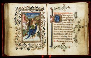 St. Christopher carries the Christ child, a hermit guiding him with a lamp