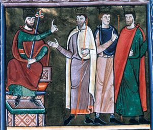 king Herod, seated in front view, holding a sceptre in his left hand, stretches his right arm forward, making a speaking gesture to the Magi, all of them holding a staff, on his left; the foremost of them stretches his right arm forward with palm in front view; the other two seem to be walking away to the right; the central one raising his right hand in speech gesture, the third one turning his head back to his right.