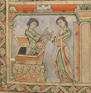 Joseph is climbing a ladder out of a pit; the gaoler holds Joseph's left hand with his left and points to an open door on the left with his right hand.