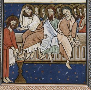 Christ, with a towel hanging down form his girdle, stretches his hands down to the foot of Peter, who holds it above a laver; Peter stretches his left hand forward and touches his forehead with his right; he seems to sit on the lap of Paul(?); two other apostles are seated on the bench, next to Peter: one holds a closed scroll, the other (John?) wipes his foot.