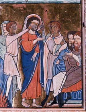 Christ is blindfolded and holds his right hand forward in a gesture of speech(?); a dark-faced soldier behind him, seizes his right arm with his left and slaps him in the face with his right hand; Caiaphas and Annas are seated together on a bench; one of them holding both hands forward, making a gesture of speech with his right, while the other one points back at him with his right hand forward; two men with dark faces, in between Christ and Caiaphas and Annas, make gestures of speech, with their right hand forward, the foremost turning his head back to his right, looking at Christ (false witnesses?).