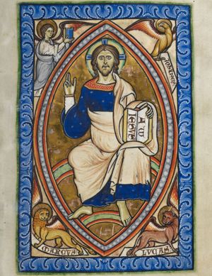 `Majestas Domini': Christ in mandorla seated on a rainbow, holding an open book with inscription and making a blessing gesture, accompanied by the symbols of the evangelists, holding inscribed scrolls and a book.