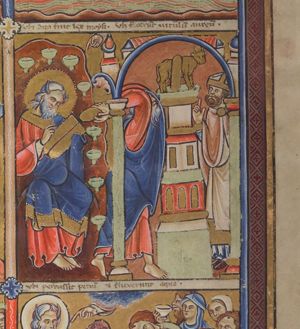 Moses holding the tables of the law in his covered left, writing on them with his right; he is surrounded by oil-lamps; the `Dexter Dei' with indes finger forward, pointing at him, above him.