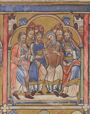 the bride and groom are seated between two groups of guests, two of which hold a cup; they are also holding cups themselves, the groom in his right, while he raises his left, making a gesture of speech; the bride in her left stretching her right hand forward with the palm in front view; architectural setting.