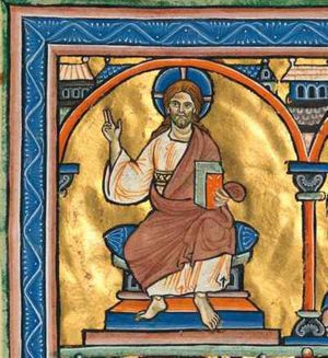 the Creator as Christ enthroned, holding his right hand sidewards in a blessing gesture and holding a book in his left; architectural setting.