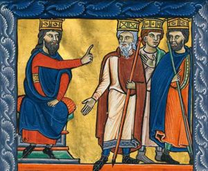 king Herod, seated at the left with his left hand on his knee, stretching his right hand sidewards to his left in a gesture of speech towards the Magi before him; two of them hold a staff; the foremost holds his right hand down with the palm in front view; the other two seem to be walking away to the right; the central one with his hand in front of his chest with the palm in front view, the one on the right turning his head back to his right, while pointing forward with his right hand in front of his chest, with which he also holds his staff.
