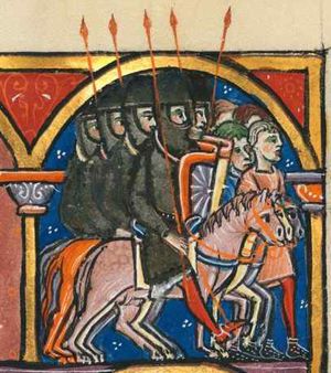 Holofernes and his army on their way: Holofernes and a few other soldiers on horseback; other soldiers on foot; several holding a lance; most are in coats in mail; a few men in short tunic, no armour or weapons, walk in front of the army; architectural setting.