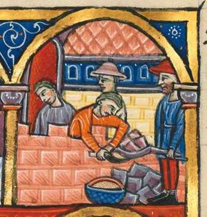 building activities: leaning over the top of a small crenellated wall, his arms downward, a mason is scooping mortar with a trowel from a tub standing on the ground in front of the wall; a heap of stones next to the tub; two men, wearing hats are carrying stones on a barrow; a fourth man behind the wall with his head slanting to his right; an edifice behind the men; architectural setting.