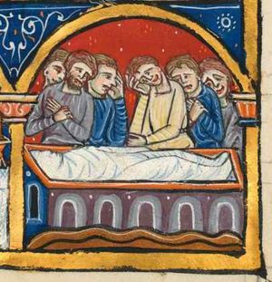 Judith, covered with a shroud, is lying in a sarcophagus; a group of men standing behind her grave, making gestures of mourning: two are wringing their hands, two rest their head in their hand, some are 'weeping'; architectural background.