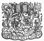 Open book with pseudo-text, ornamental flowers, banderole with inscription