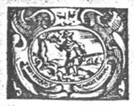 A man with a sword stands next to a slain dragon(?); decorated frame