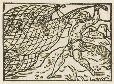 A man holding up a net to catch the wind