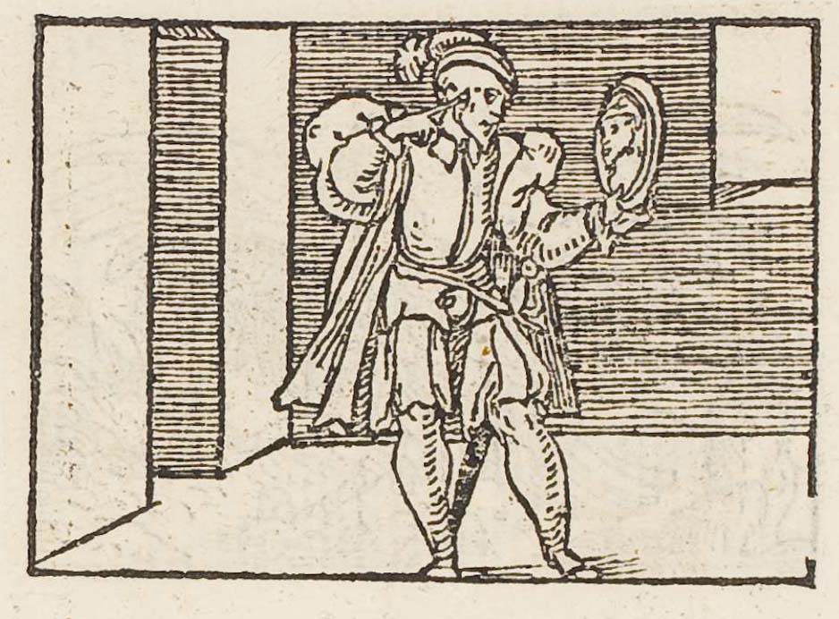 A man looking at his face in a hand mirror