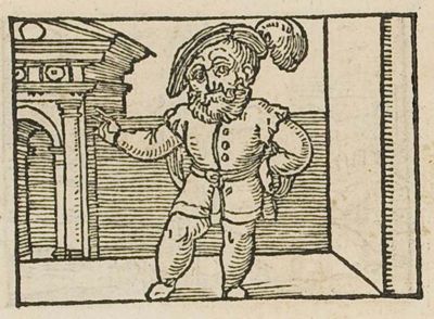 A short man with a disproportionately large head