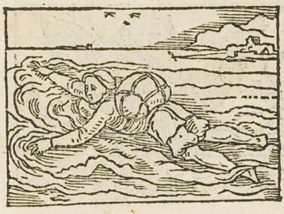 A naked man swimming with a heavy bundle on his back