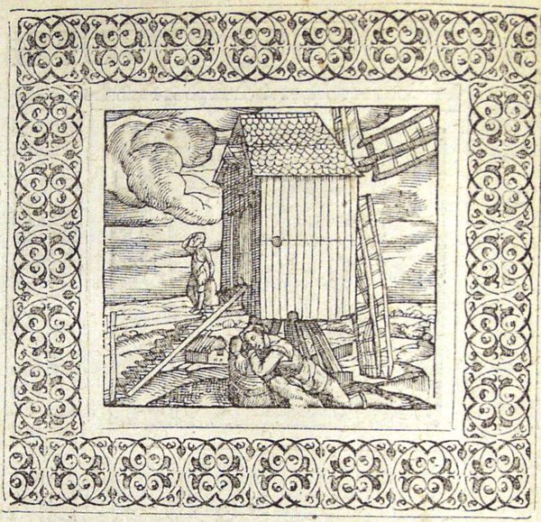 Windmill with unmoving vanes; a sleeping man