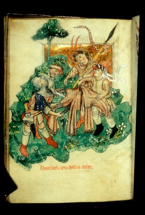 Soldiers cutting up the seamless garment