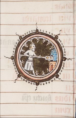 December: Baker slipping bread into the oven