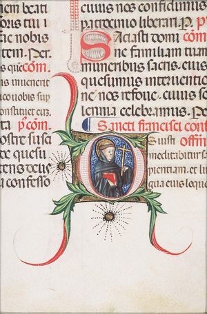 St. Francis of Assisi holding a book and a crucifix
