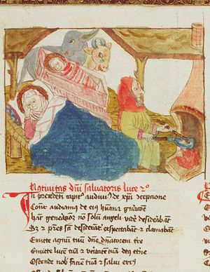 The Nativity: the Christ-child in the manger, Mary lies in bed, St. Joseph prepares a meal