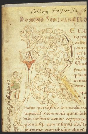 Man holding a staff in one hand and pointing upward with the other