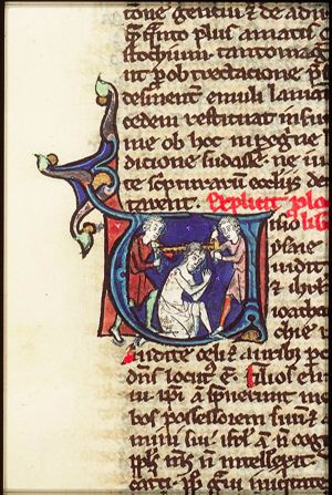 The martyrdom of Isaiah: he is sawn in two