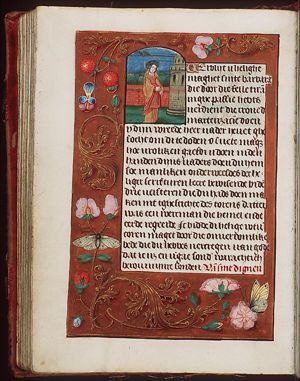 St. Barbara holding a book, a tower beside her