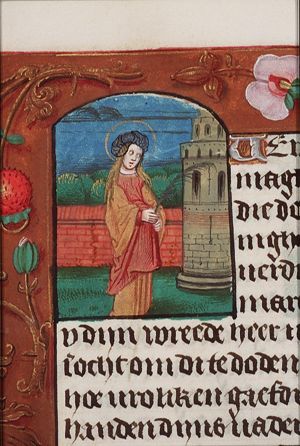St. Barbara holding a book, a tower beside her