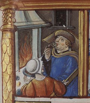 January: a man and a woman dining and warming themselves at a fire