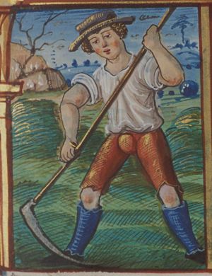 July: a man mowing grass