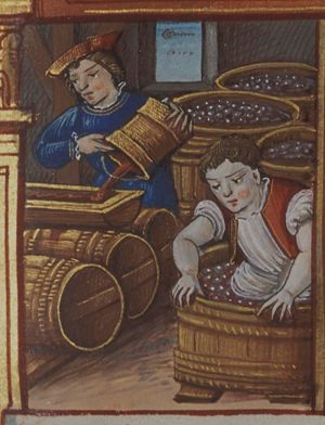 October: a man treading grapes; man pouring wine into barrel